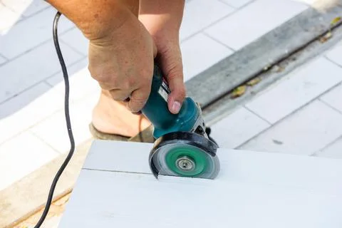 Using the angle grinder Stock Photos