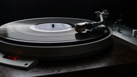 Using an antiquarian vinyl record player. turntable player Stock Footage 99042813