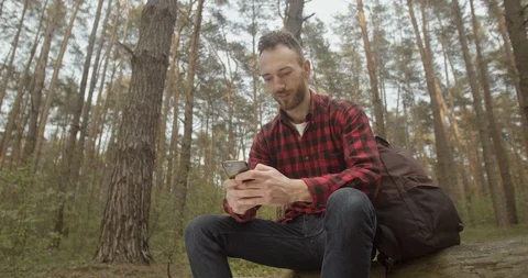 Using App in the Forest 動画素材 109114516