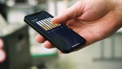 Using an app in a warehouse Stock Footage 143463553