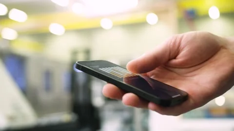 Using an app in a warehouse Stock Footage 143463557