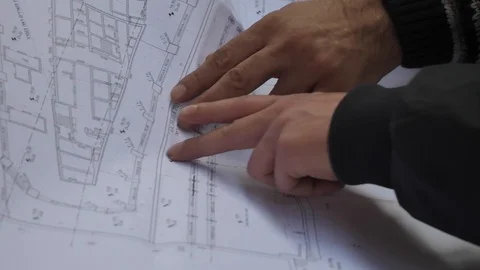 Using architectural plans Stock Footage 104967695