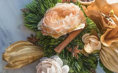 Using artificial flowers and fragrant spices as christmas tree decoration Stock Photos