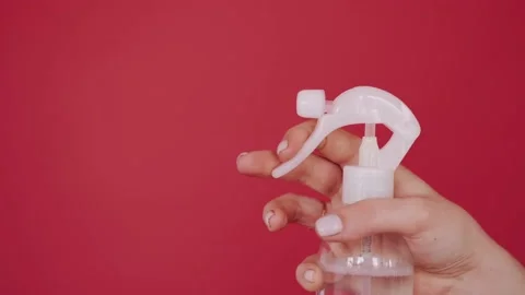 Using an atomizer or sprayer Stock Footage 150198653