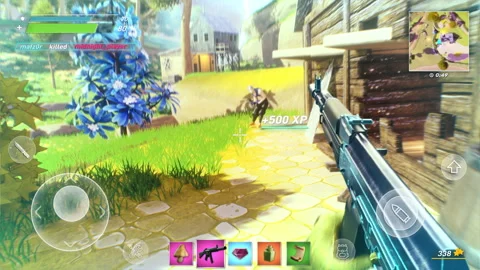 Using the automatic rifle in the cartoon phone battle royale video game Stock Footage 245708984