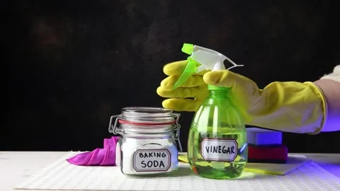 Using baking soda Sodium bicarbonate and white vinegar for home cleaning. Stock Footage 147860628