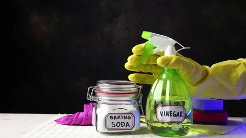Using baking soda Sodium bicarbonate and white vinegar for home cleaning. 스톡 동영상 147860750