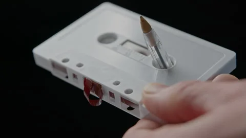 Using a Ballpoint Pen to Wind Slack Magnetic Tape Back Into an Audio Cassette Видео 290046477