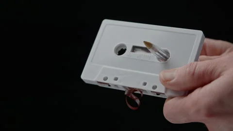 Using a Ballpoint Pen to Wind Slack Magnetic Tape Back Into an Audio Cassette Видео 290046540