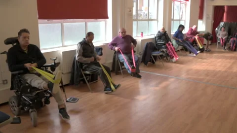 Using bands is a great way to help strengthen your muscles and add flexibility Stock Footage 236772683