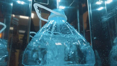 Using big plastic bottle for water collection. Reusing plastic for drinking wate Stock-Footage 122408655