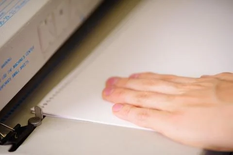 Using binding machine for binding documents with plastic ring binder Stock Photos