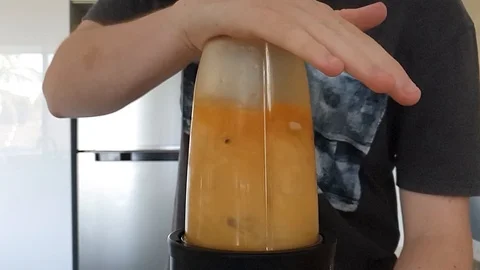 Using a Blender Stock Footage 123264386