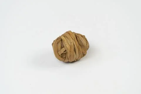 Using brown rubber band for making plastic bouncing ball Stock Photos
