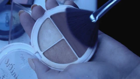Using of a brush in a cosmetic bag ,slow motion Stock-Footage 85571447