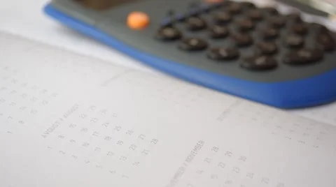 Using calculator on the diary 스톡 동영상 60222424