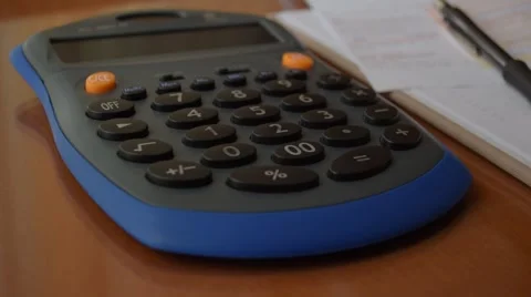 Using calculator Stock-Footage 60222343