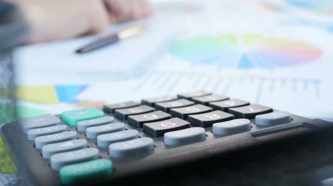 Using Calculator Stock Footage 64058606
