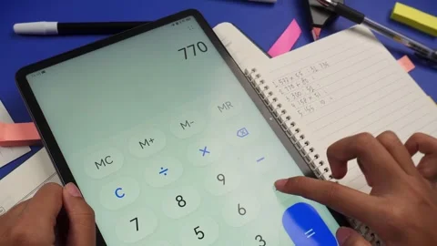 Using calculator on a tablet to do math Stock Footage 276826760