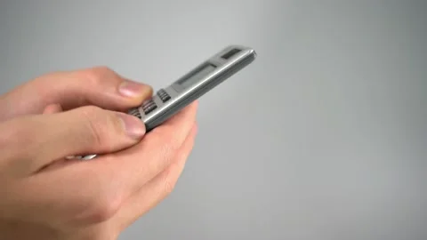 Using calculator for taxes and math with white background studio shot Video stock 145512278
