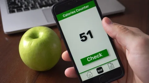 Using calorie counting app on the smartphone, a diet application Stock Footage 109404378
