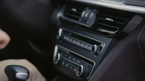 Using Car Stereo While Driving Video stock 255368429