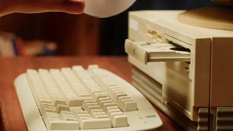 Using CD circle disk for old computer. Dvd player, disc drive. Music recorder Stock Footage 207144585