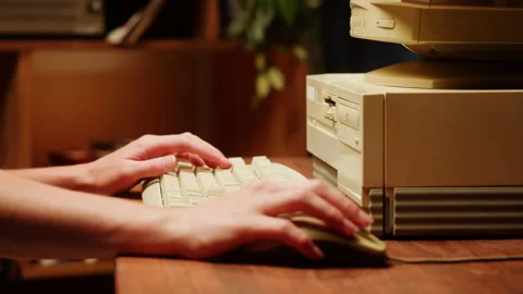 Using CD circle disk for old computer and typing on keyboard. Dvd player, disc Stock Footage 208090706