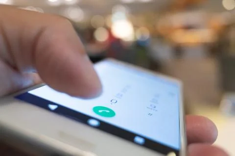 Using cellphone to dial Stock Photos