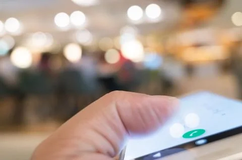 Using cellphone to dial Stock Photos