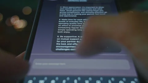 Using the Chat Bot on smartphone to ask questions and reading the answer Stockbeeldmateriaal 288969172