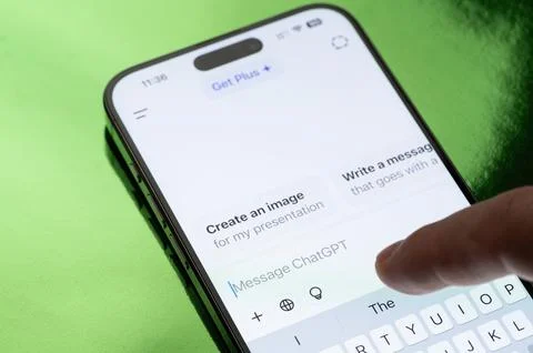 Using ChatGPT AI app on smartphone Stock Photos