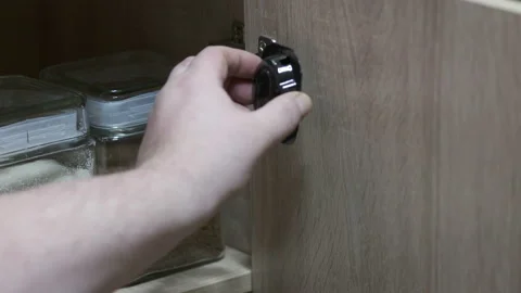 Using cockroach killing baits to kill roaches in the kitchen. Stock Footage 97223057