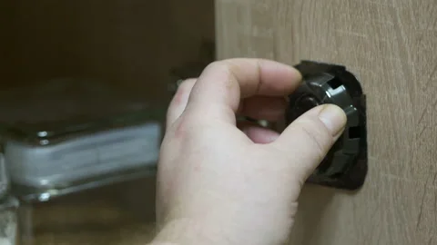 Using cockroach killing baits to kill roaches in the kitchen. Stock Footage 97223141