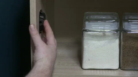 Using cockroach killing baits to kill roaches in the kitchen. Stock Footage 97223330