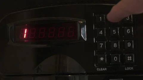 Using Code Safe. Man Hand Opened Safe. The man opens the code safe and gets out Stock Footage 147550805