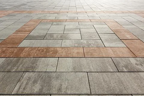 Using color to create a paving slab ornament. Selective focusing. Foto stock