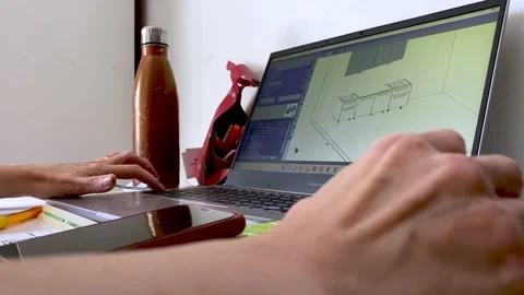 Using a computer-aided design program to design a project Video stock 200081754