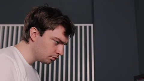 Using computer, computer work, intense concentration Stock-Footage 284475687