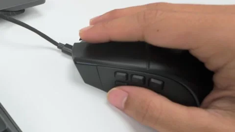 Using Computer Mouse with Multiple Buttons Closeup on White Desk Stock Footage 311794792