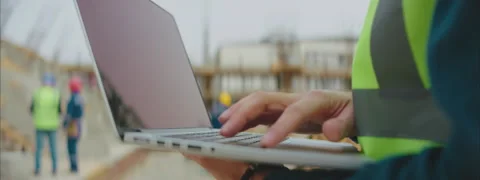 Using a Computer on the Site Stock Footage 150864260
