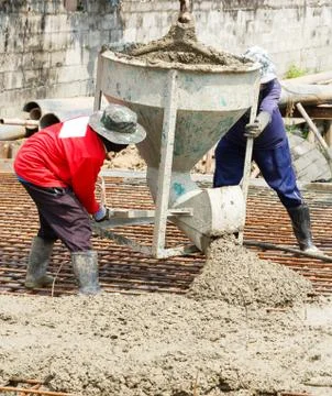 Using concrete bucket Stock Photos