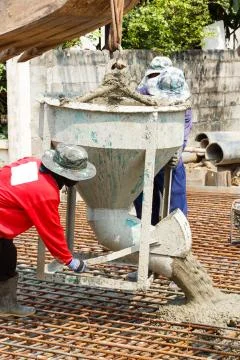 Using concrete bucket Stock Photos