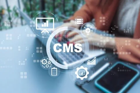 Using a content management system on a laptop for website development Stock Photos