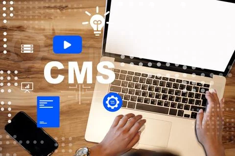 Using a content management system on a laptop for organizing digital content Stock Photos