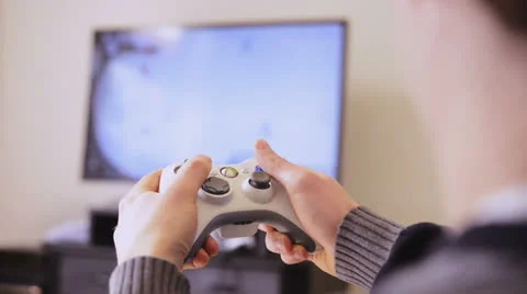 Using a controller to play a video-game 스톡 동영상 22571866