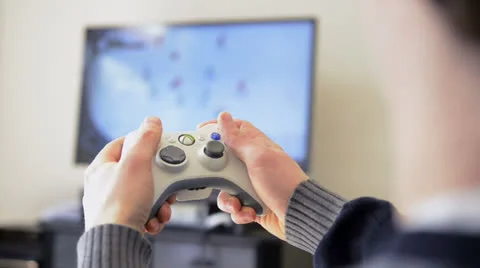 Using a controller to play a video-game 스톡 동영상 22571888