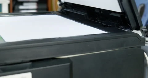 Using a copy machine to copy some documents. Stock Footage 172289588