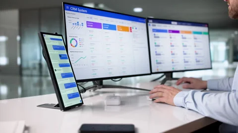 Using Corporate Messaging App On Secondyry Screen Stock Footage 328709050