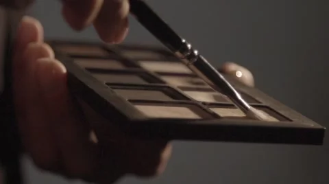 Using cosmetics in slow motion Stock Footage 67857054